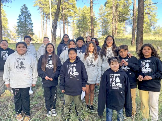 Paiute youth 10-12 gather for a group photo at Mt. Trumbull for the Yevingkarere Camp.