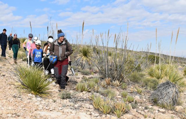 Ellen Trautner, a natural resource specialist and cave expert for the Bureau of Land Management’s Carlsbad Field Office, leads a group to McKittrick Cave near Carlsbad, N.M., Nov. 25, for a cave restoration project.