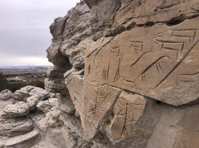 Angled view of a petroglyph panel in Cedar Canyon