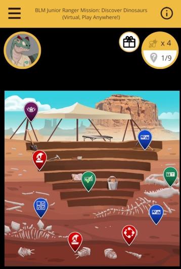 Image shows a color drawing of a desert landscape with steps, dinosaur bones, and a shade cover over a table with sandstone mesas in the background, plus several icons to click on to compete the missions.