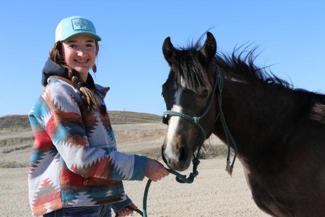 Youth from Treasure Valley area 4-H Club works with horse. Photo credit: BLM 