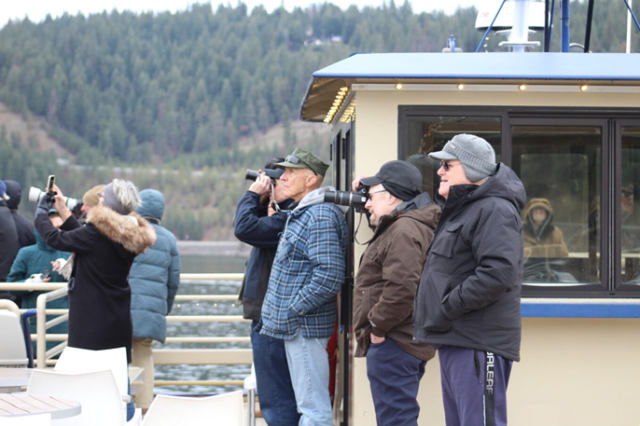 Attendees brave the cold to get a better view of the eagles. (photo by Alexa Oyola)