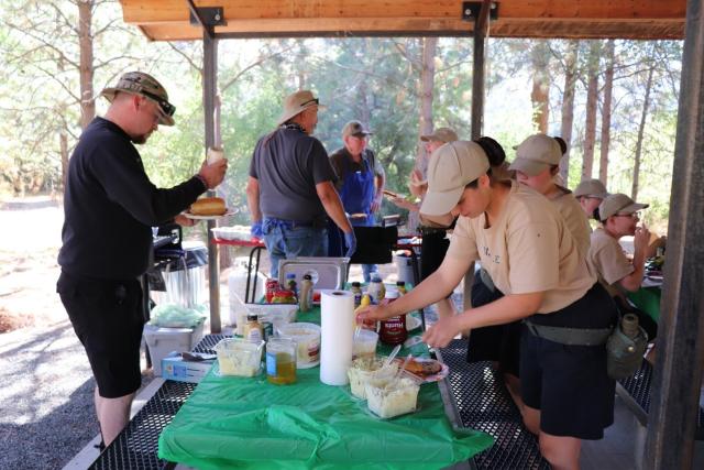 Volunteers refuel after a hard day of work out on the river. (Photo credit: Rebecca Urbanczyk) 