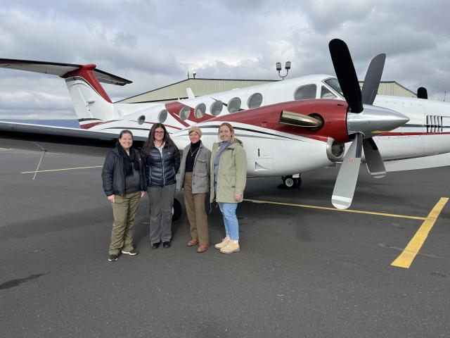 BLM Utah Curator and NAGPRA Coordinator Diana Barg (left) with WSU Museum of Anthropology Director Dr. Samantha Fladd (center left), BLM Utah Tribal Liaison Jessica Montcalm (center right) and WUS Museum of Anthropology Curator Madison Pullis (right) after weather-related rerouting in Lewiston, Idaho.