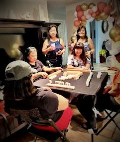 Playing mahjong with friends at a celebration. Photo courtesy of Jennifer Pable