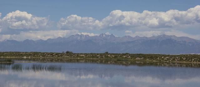 Mountains form a backdrop for the Blanca Wetlands ACEC