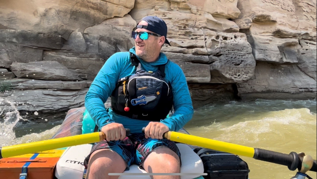Brian Bucket on the river rafting on the Green River in Utah