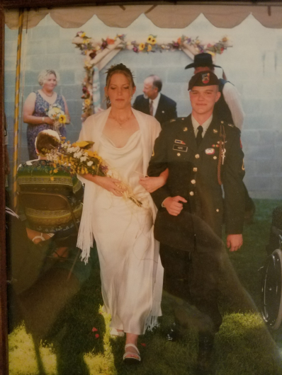 Nic and Annie exit down the aisle at their wedding