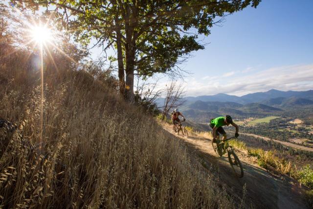 two cyclists riding the Mountain of the Rogue Trail System