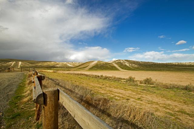 fencing and hills around the Virtue Flat Off-Highway Vehicle Area