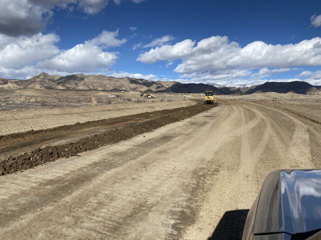 Contruction crews work on embankment excavation and grading on the 18 Road project in Grand Junction, Colorado.