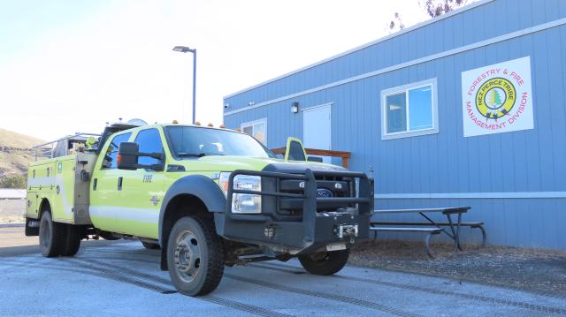 A large green yellow truck