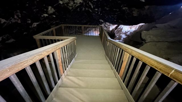 Wooden platform stairs inside a cave