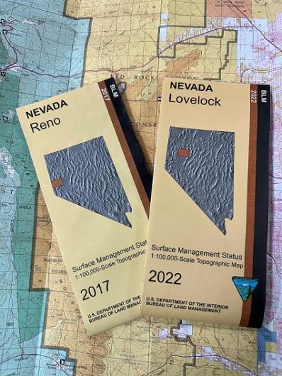 Two folded map brochures