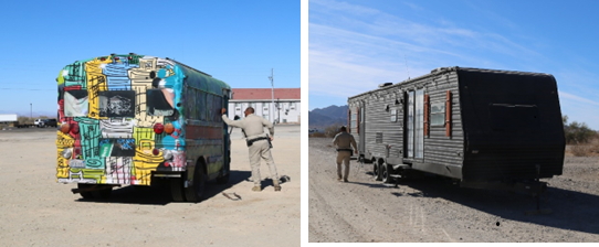 A colorful abandoned bus is on the left and an abandoned RV is on the right.