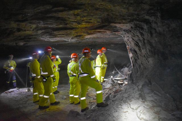New Mexico personnel view a recently mined portion of a potash mine near Carlsbad.