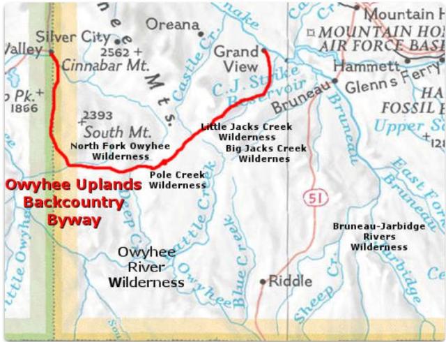  map showing the route of the remote Owyhee Uplands Back Country Byway, marked in red. Blue lines indicate rivers and creeks. Idaho State Highway 51 bisects the center of the map north and south.