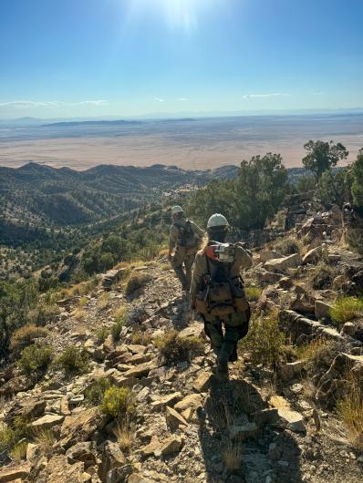 Members of Salt Lake Helitack descending down a mountain after responding to a fire call. Photo by Dr. Drew. 