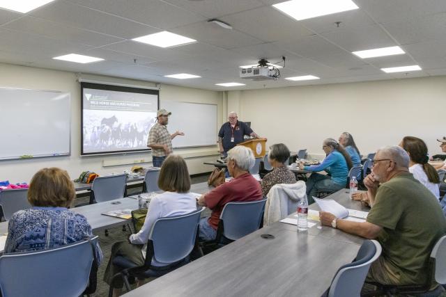 On June 12, 2025, the Bureau of Land Management wild horse and burro specialist Eddie Vandenburg from the Rawlins field office visited Casper College to share firsthand experience with students enrolled in "The Wild Hrose Effect," course led by Dr. Chad Hanson. 