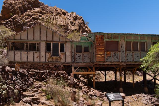 A building on a slope of a canyon.