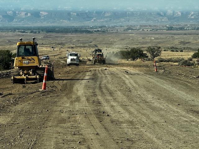 Construction equipment work on 18 Road repaving project
