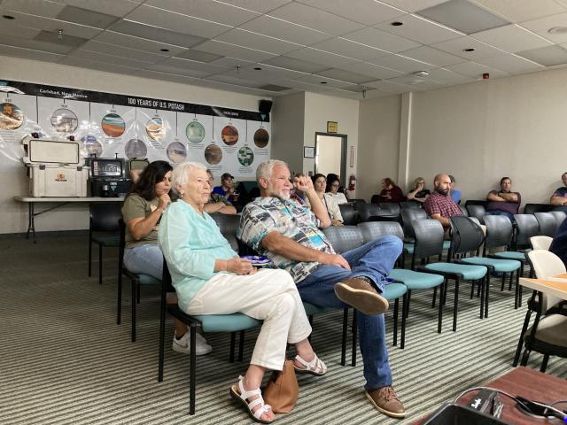 Jim Rutley, a CFO geologist and expert in potash, sits with his mother, Pat Rutley, during the presentation.