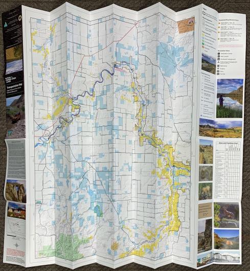 Photo of the Upper Missouri River Breaks National Monument transportation map, printed and folded.