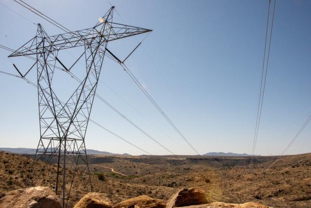 Large transmissions lines crossing public lands in Arizona.