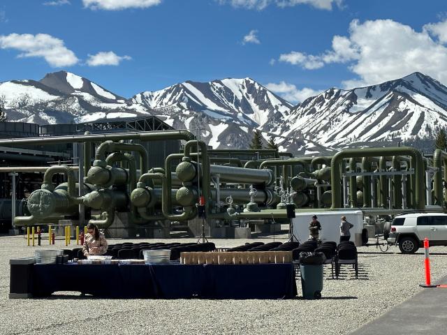 Staff sets up table at ribbon cutting ceremony preparations for the 30-megawatt Casa Diablo IV geothermal development project 