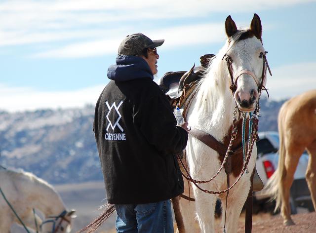  A rider from the Northern Cheyenne Tribe prepares to mount and ride in commemoration events held March 17. The Northern Cheyenne Reservation is located to the east of the battle site in the adjoining Rosebud County, in southeast Montana.