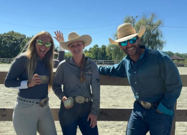 From left to right, Jen, Reagan and Joe Musicaro standing outside at the ranch.