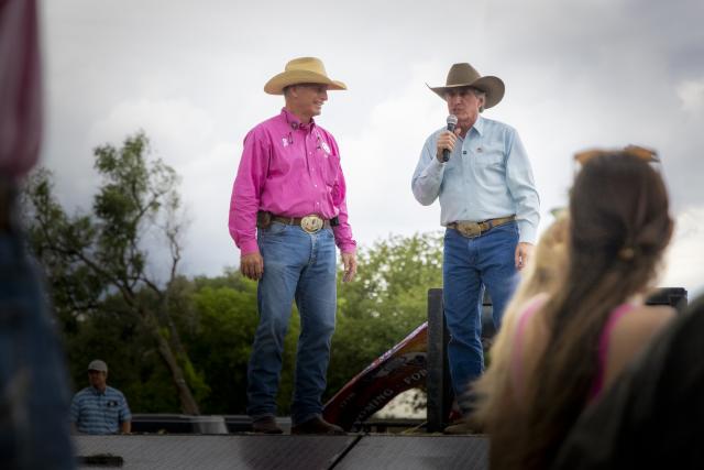 Secretary of the Interior Doug Burgum, right, and Wyoming Gov. Mark Gordon address the crowd before the Bureau of Land Management's annual wild horse adoption event at Lions Park 
