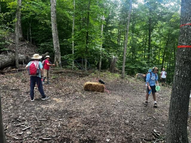 Scouts explore a station along the Conservation Trail at Scouting America’s 2026 National Jamboree, where Bureau of Land Management staff led hands‑on activities focused on outdoor ethics and public land stewardship.