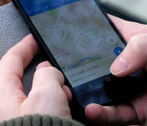 Close-up of navigation app on mobile phone