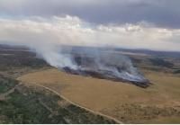 Aerial photo of Alkali Ridge Fire burning in field