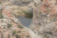 natural pool of water on rocks