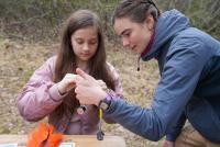 Teaching fly tying the Science Center annual Outdoor Week Event.jpg