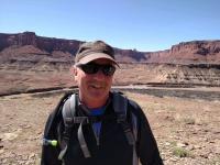 Kirk Halford hiking to ancient ruins in Canyonlands National Park