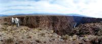 Jim Irwin (right) and Dave Scott examine the interior of the Río Grande Gorge from the west rim during their training March 11–12, 1971. Photo by NASA.