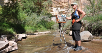 Artist-in-Residence Loretta Domaszewski plein air painting at Sand Creek
