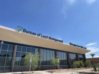Bureau of Land Management office. Front side of office has many windows and sign on top says Bureau of Land Management Managing Your Public Lands.