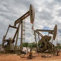 Image of two oil and gas pumps.