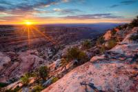 A sunset with pink cliffs