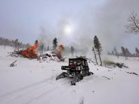 To remove the leftover fuels after thinning treatments, wood is gathered into piles and then burned during parts of the year when accidental spread is least likely.