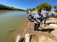 Students collect water samples along the San Juan River in Utah.