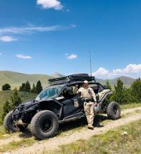 BLM Field Staff Ranger Emily Romig out on BLM lands. Photo credit: BLM