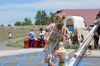 A Native American dancer performs at the Trails Center. 