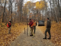 A BLM cadastral survey team works alongside a USDA Forest Service Surveyor in Chippewa National Forest in establishing the boundaries for the parcels identified for transfer to the Leech Lake Band of the Ojibwe. 