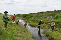 Personnel from the U.S. Fish and Wildlife Service and the BLM, as well as an intern from Conservation Corps New Mexico, conduct a survey for Koster’s springsnail, the Roswell springsnail and Noel’s amphipod at the Rio Hondo Spring Run on the Bitter Lake National Wildlife Refuge in Roswell, New Mexico on July 8.
