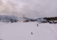 snow on ground near burn piles